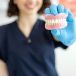 Can you sleep with your dentures in